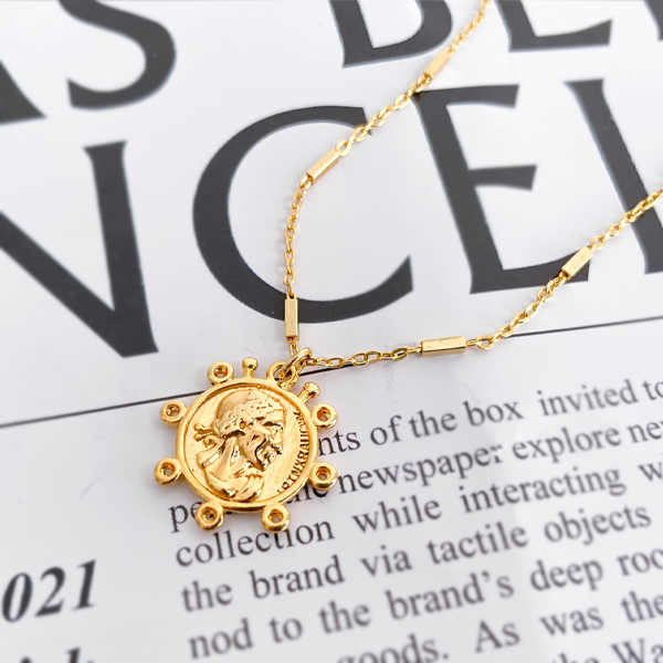 Delicate gold-colored coin pendant holly necklace