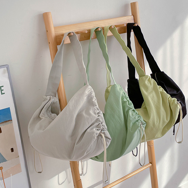A string hobo bag that is great to match anywhere casually.