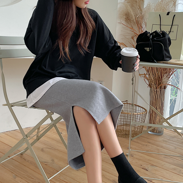 Thick knit team skirt that creates a slim line